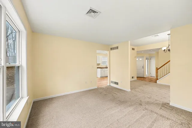 an empty room with a natural light