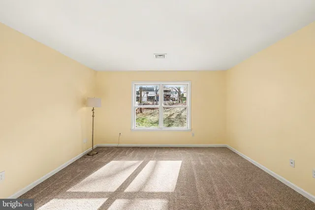 a view of a kitchen with a sink a kitchen and a window