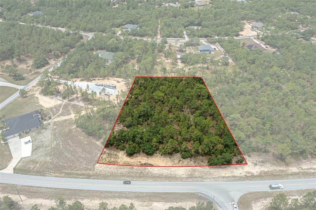 6349 West Pine Ridge Boulevard Beverly Hills, FL 34465 - Photo 1 of 1 a view of a yard