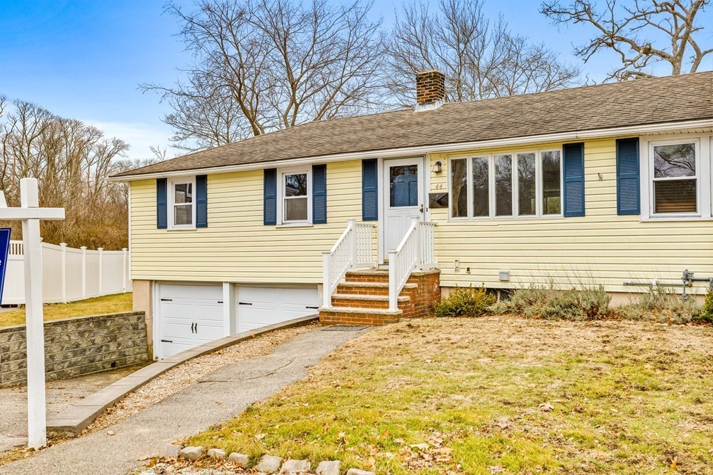 44 Rhodes Circle, Unit 44 Hingham, MA 02043 - Photo 1 of 23 a front view of a house