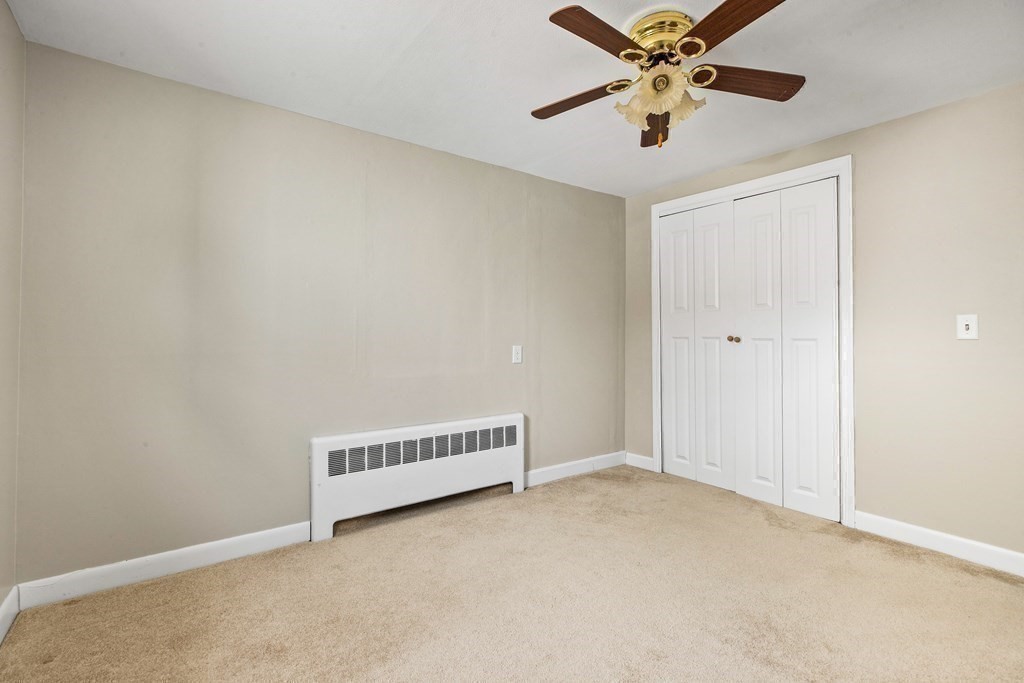 44 Rhodes Circle, Unit 44 Hingham, MA 02043 - Photo 17 of 23 a view of an empty room