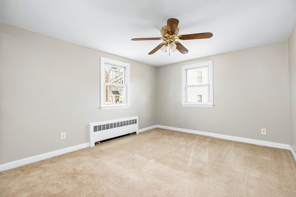 44 Rhodes Circle, Unit 44 Hingham, MA 02043 - Photo 18 of 23 a view of an empty room with a window