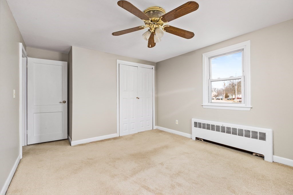 44 Rhodes Circle, Unit 44 Hingham, MA 02043 - Photo 19 of 23 a view of an empty room with a window