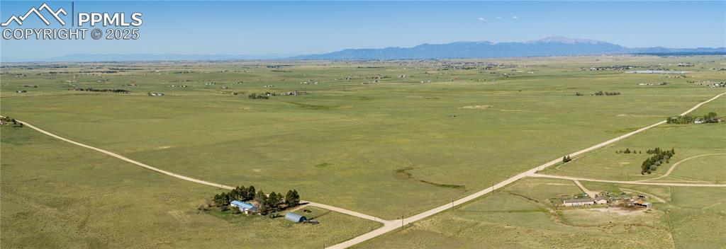 13754 Log Road Peyton, CO 80831 - Photo 5 of 29 a view of an ocean and a mountain