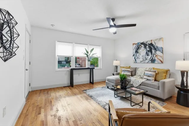 a living room with furniture and window