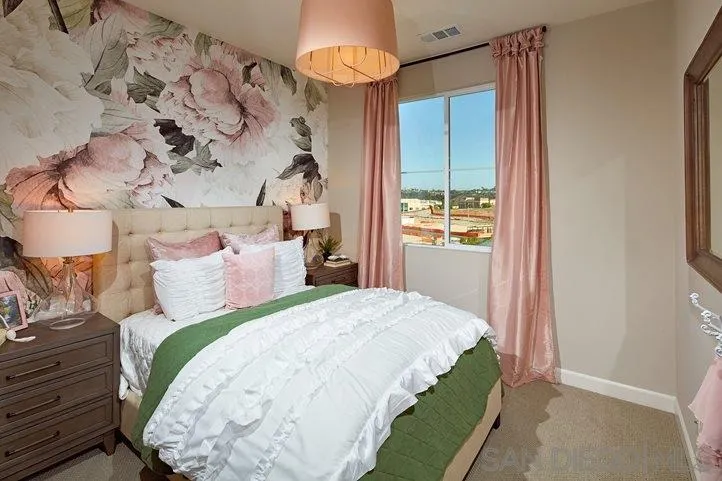 3543 Conner Way Oceanside, CA 92056 - Photo 13 of 17 a bedroom with a bed and a window