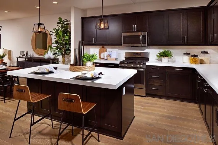 3543 Conner Way Oceanside, CA 92056 - Photo 2 of 17 a kitchen with a sink cabinets and appliances