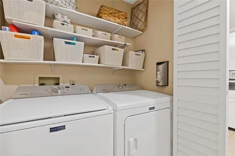 a bedroom with a bed and ceiling fan