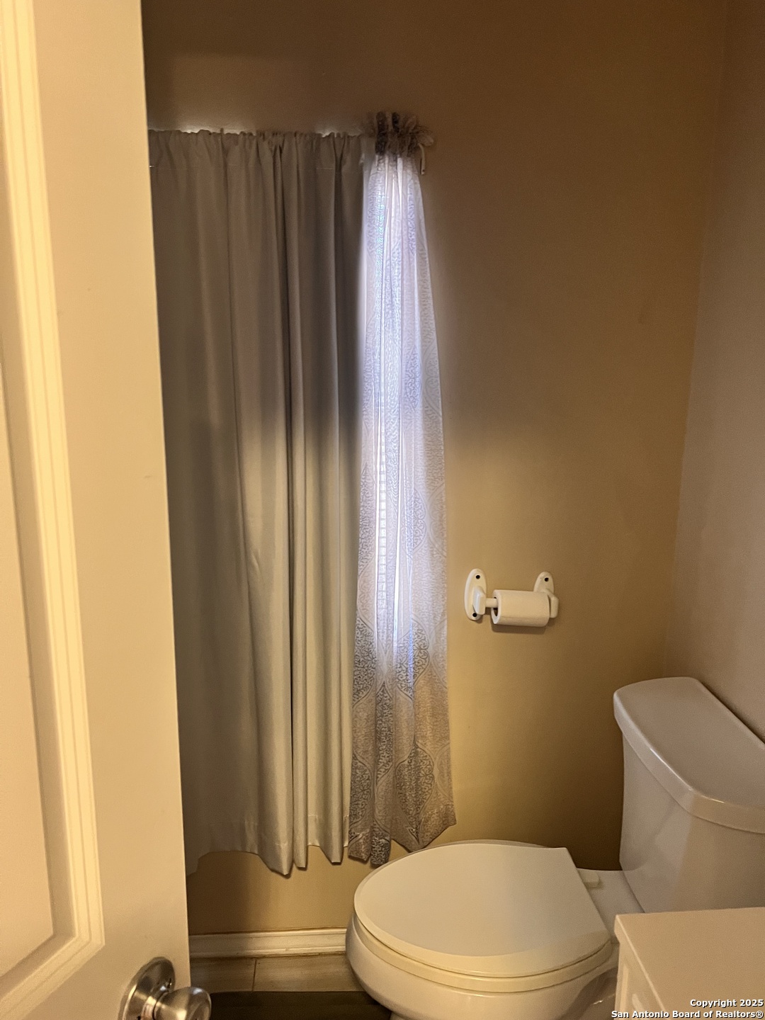 7614 Von Ormy Road Von Ormy, TX 78073 - Photo 14 of 27 a bathroom with a toilet and a shower