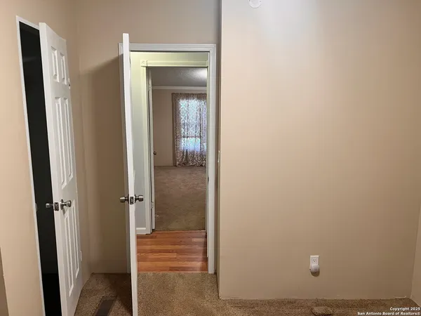 an empty room with a door