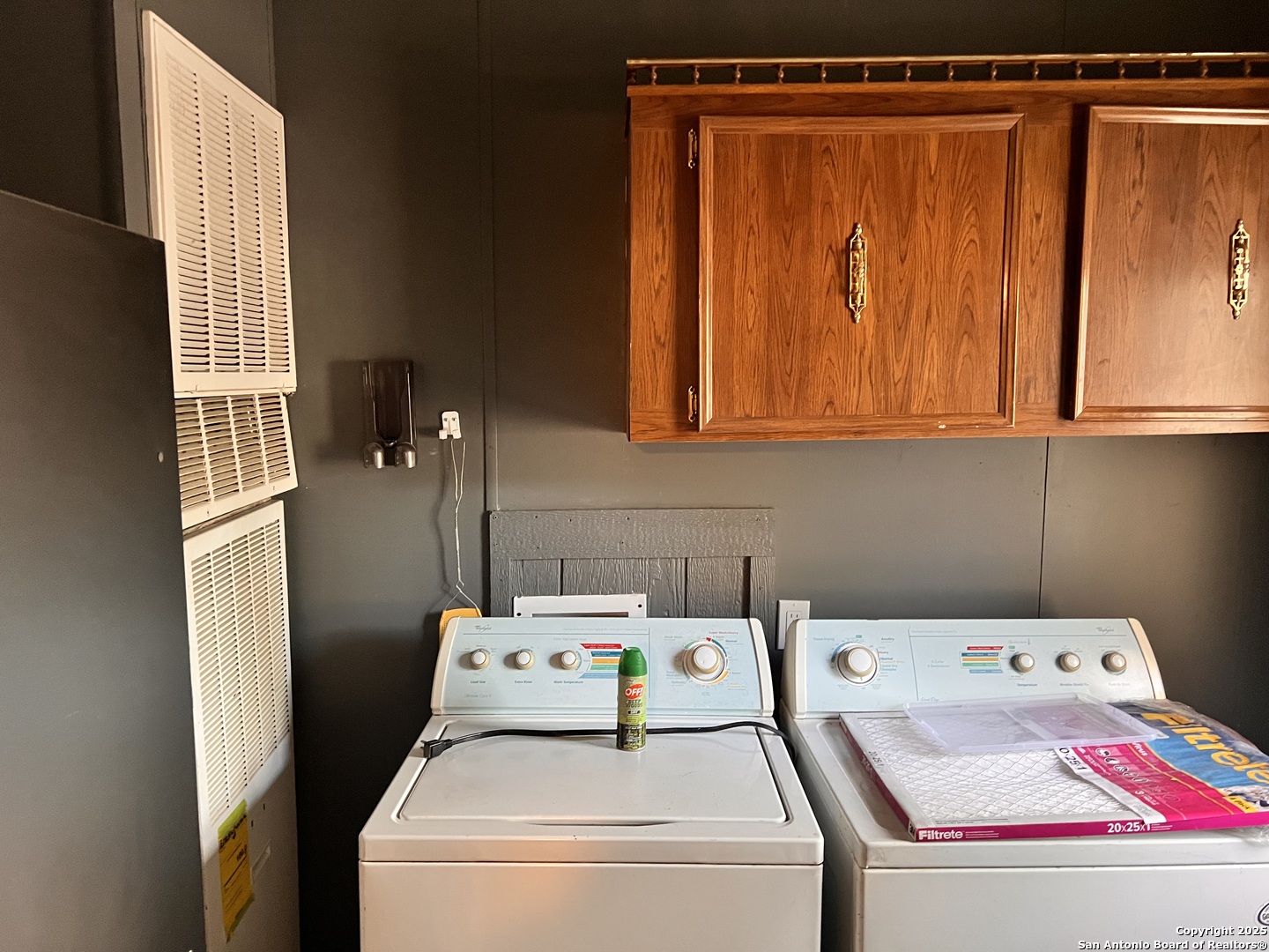 7614 Von Ormy Road Von Ormy, TX 78073 - Photo 27 of 27 a utility room with dryer and washer