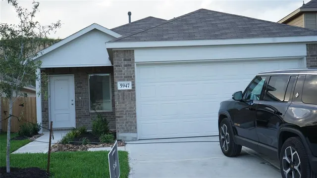 a car parked in front of house