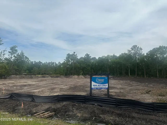 a view of a back yard of the house