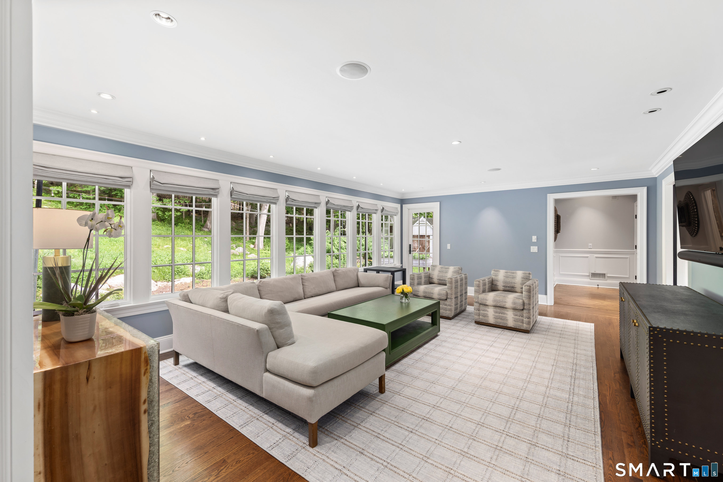 99 Hickok Road New Canaan, CT 06840 - Photo 6 of 39 a living room with furniture and a large window
