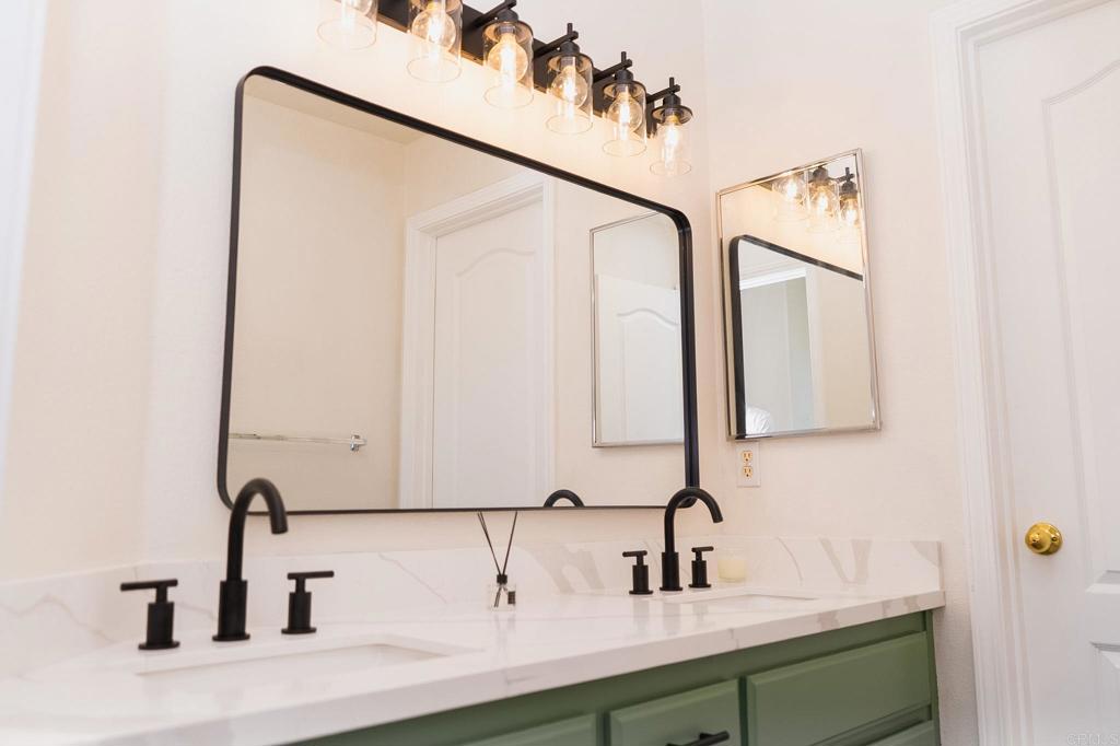 3005 Litt Road Modesto, CA 95355 - Photo 34 of 53 a bathroom with a sink and a mirror