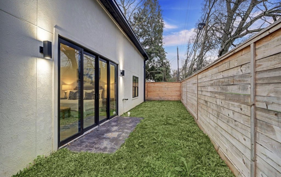 1709 Reverse Street Houston, TX 77055 - Photo 27 of 29 a view of an entrance to house with yard and green space