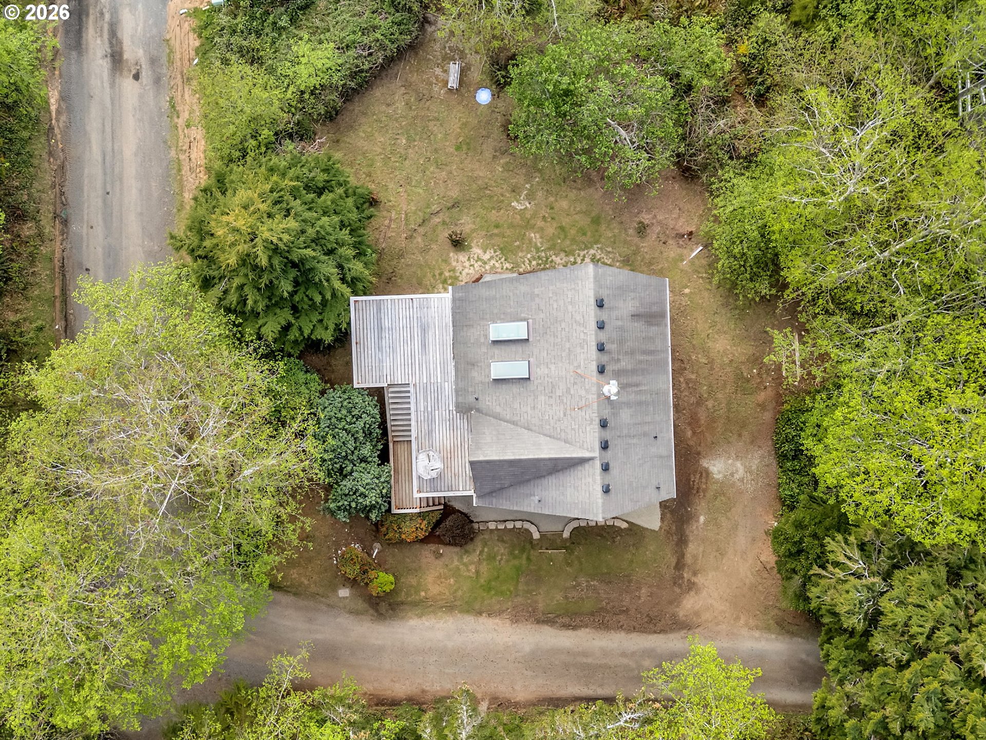 80248 Woodland Heights Road Arch Cape, OR 97102 - Photo 29 of 33 an aerial view of residential house with outdoor space