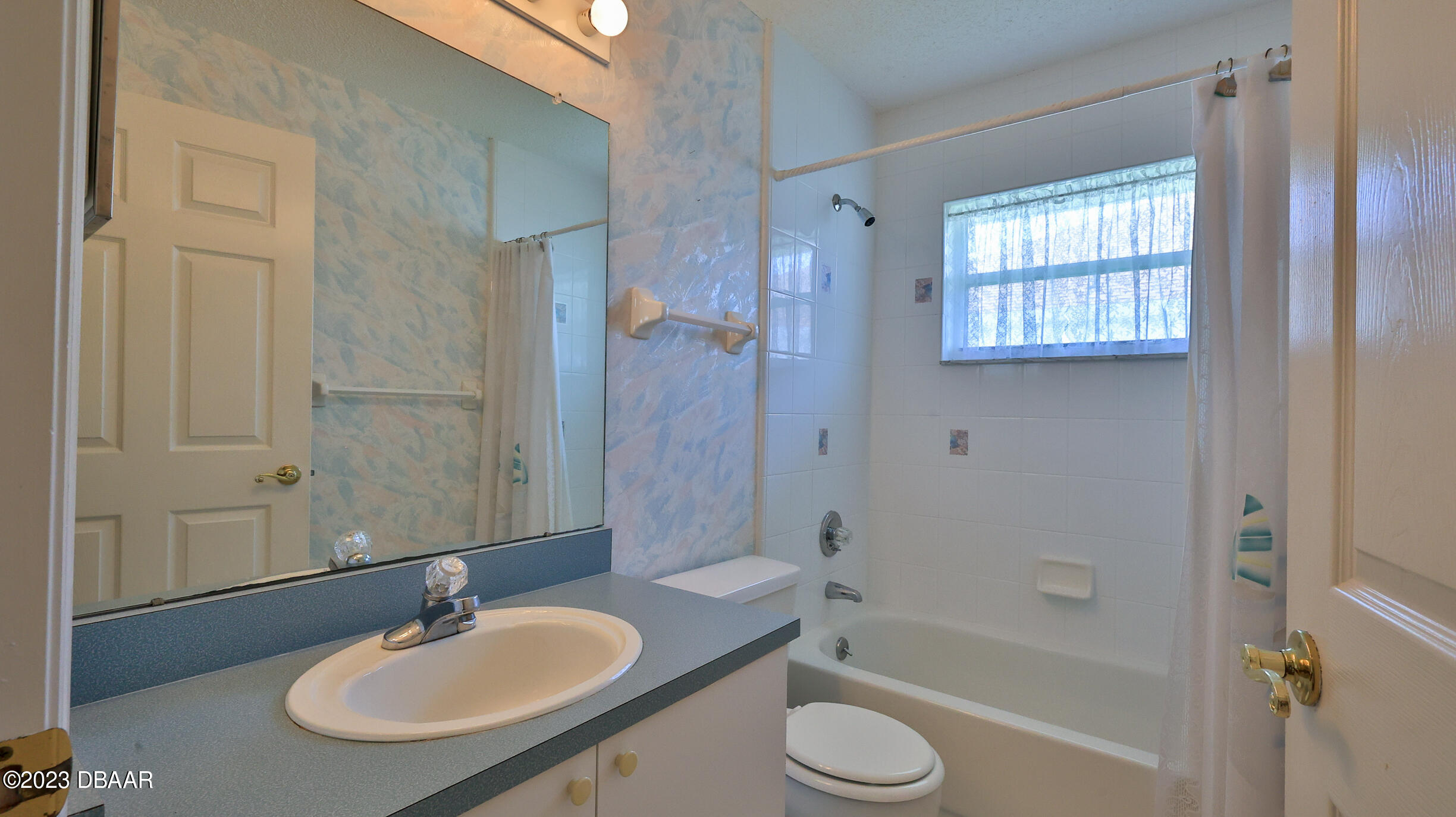 107 Sandpiper Ridge Drive Ormond Beach, FL 32176 - Photo 21 of 53 a bathroom with a sink toilet a tub and shower