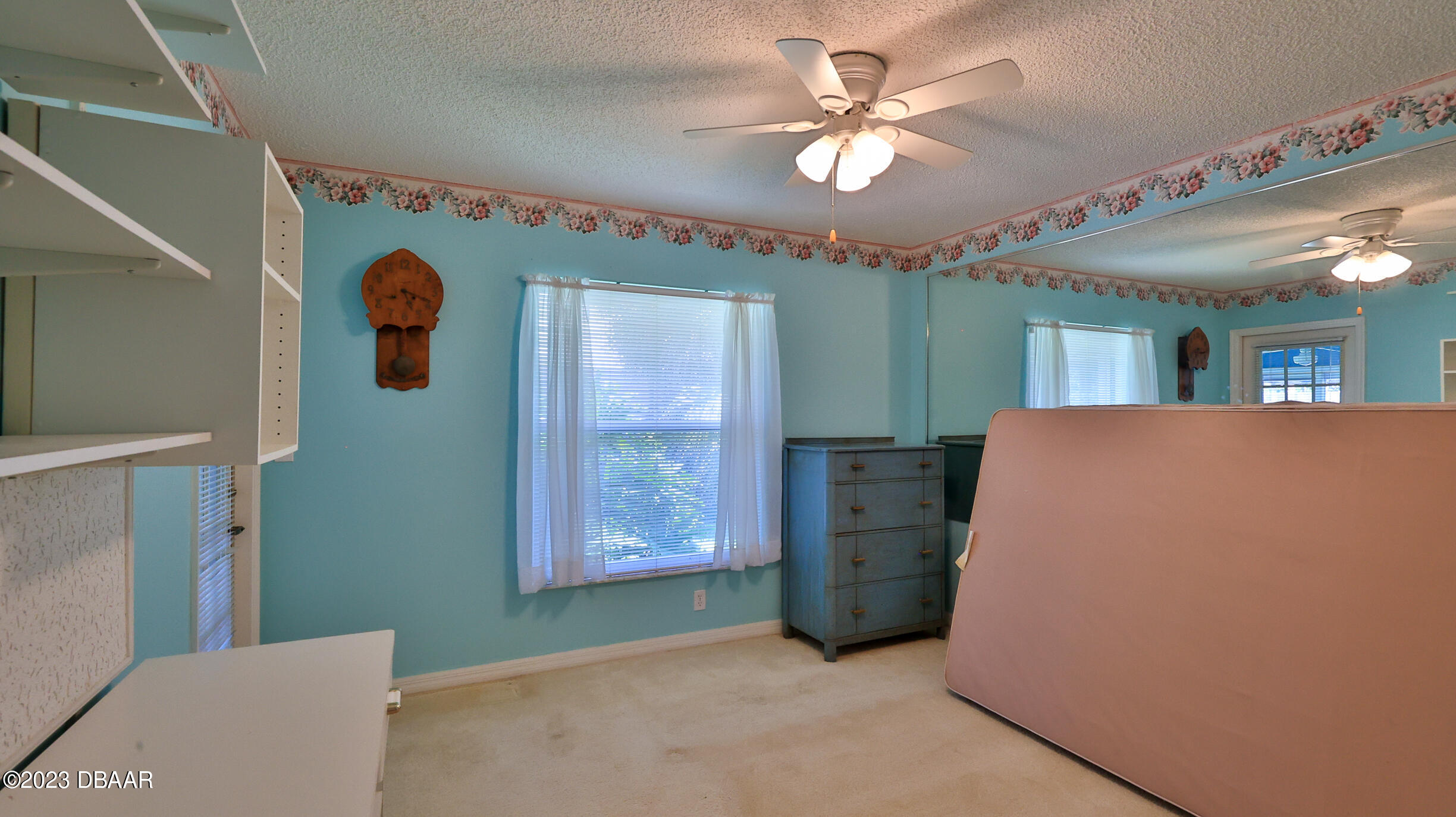 107 Sandpiper Ridge Drive Ormond Beach, FL 32176 - Photo 22 of 53 a view of a livingroom with furniture and a chandelier fan