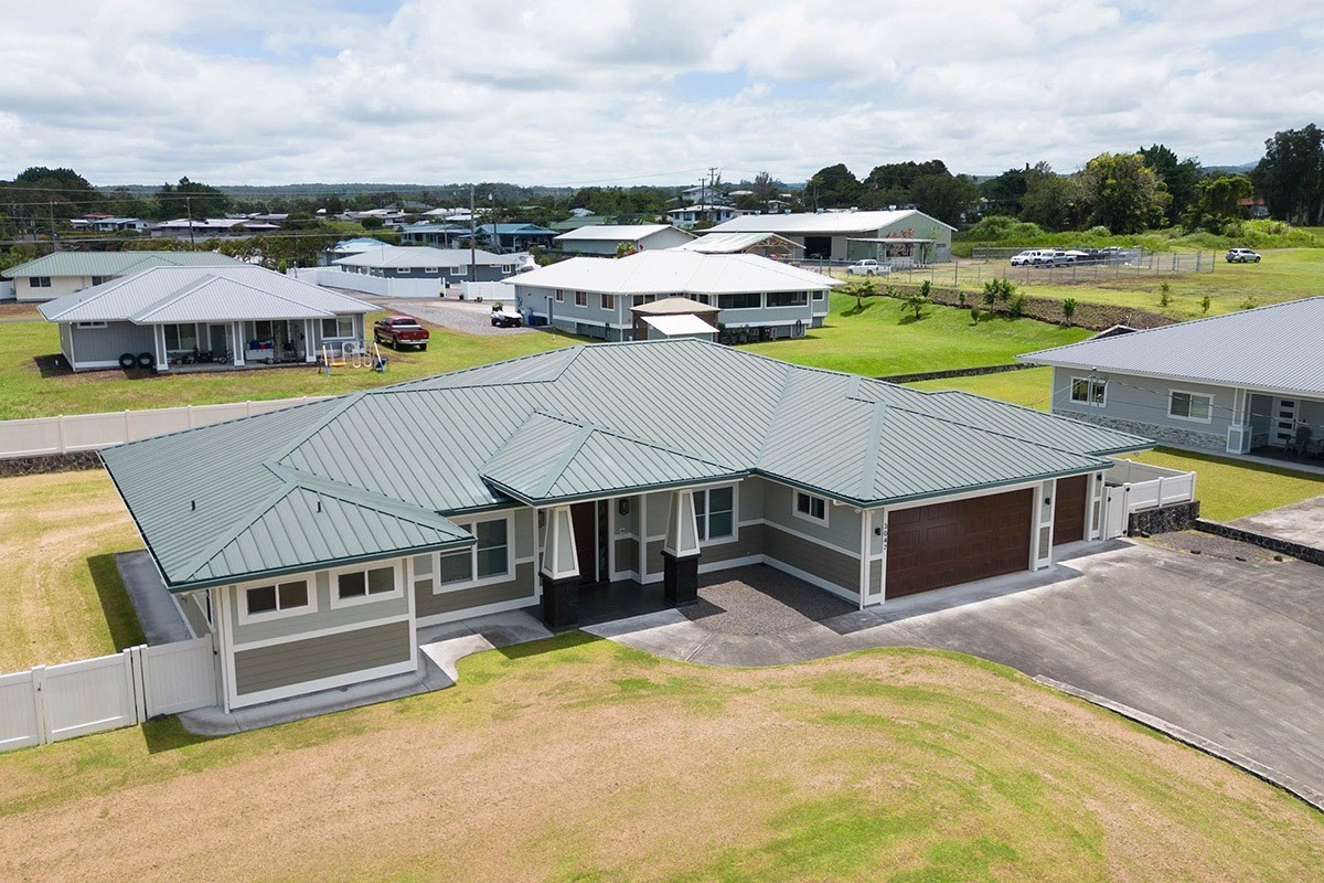 3047 Lou Street Hilo, HI 96720 - Photo 1 of 30 a aerial view of a house with a swimming pool