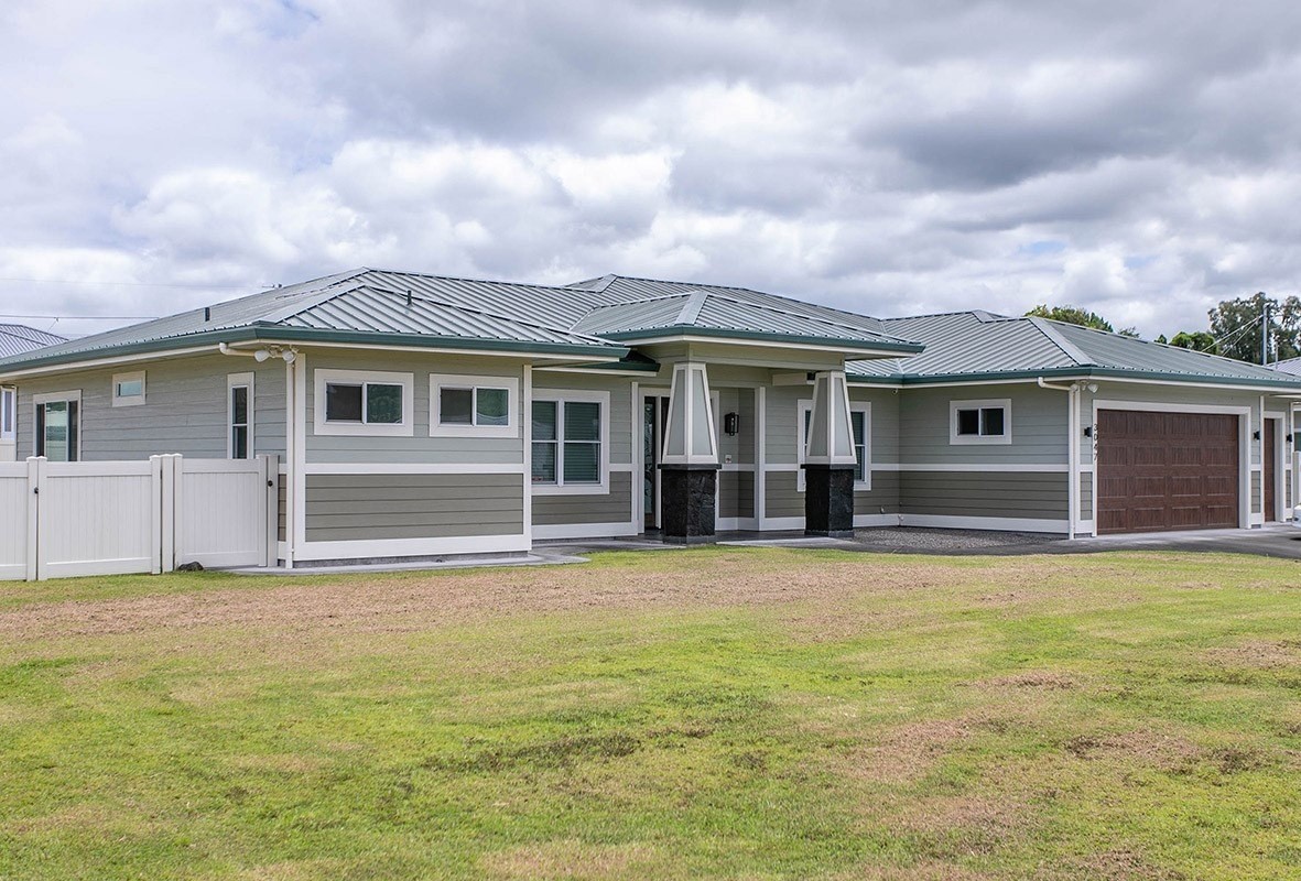 3047 Lou Street Hilo, HI 96720 - Photo 4 of 30 a view of a yard in front of a house