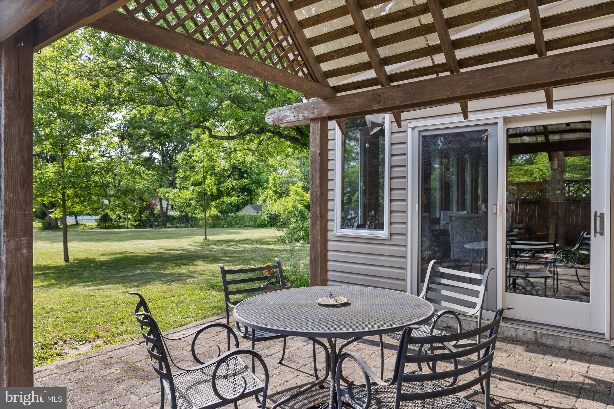 52 Prizer Road Phoenixville, PA 19460 - Photo 20 of 36 Lovely Patio and Yard Beyond Off Sunroom