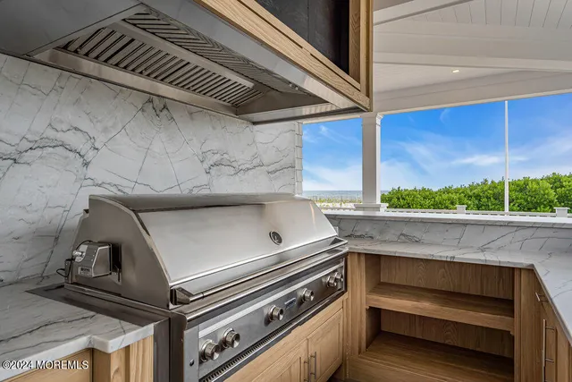 a utility room with sink dryer and washer