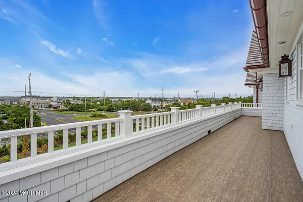 a kitchen with a refrigerator and a stove