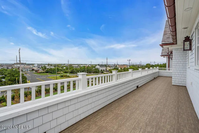 a kitchen with a refrigerator and a stove