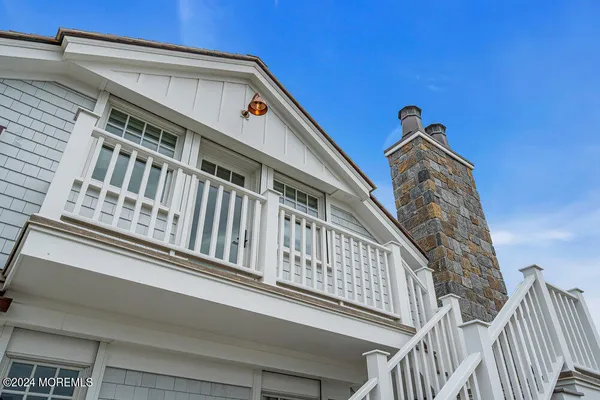 a bathroom with a granite countertop sink mirror and double