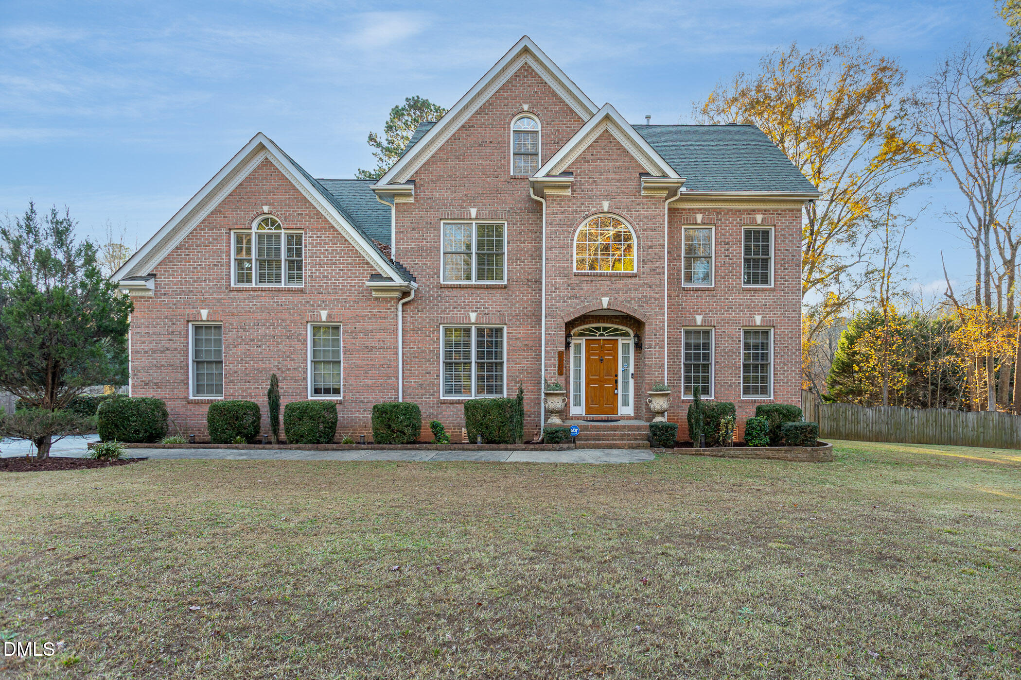 9409 Ray Road Raleigh, NC 27613 - Photo 1 of 47 a front view of a house with a yard