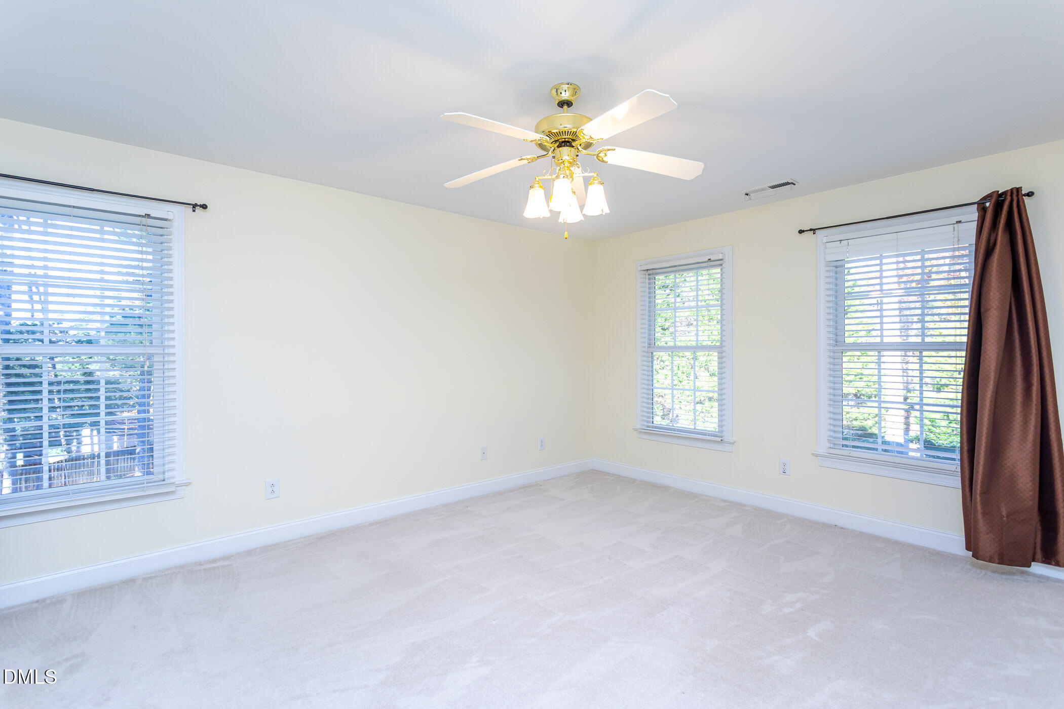 9409 Ray Road Raleigh, NC 27613 - Photo 13 of 47 a view of an empty room with a window