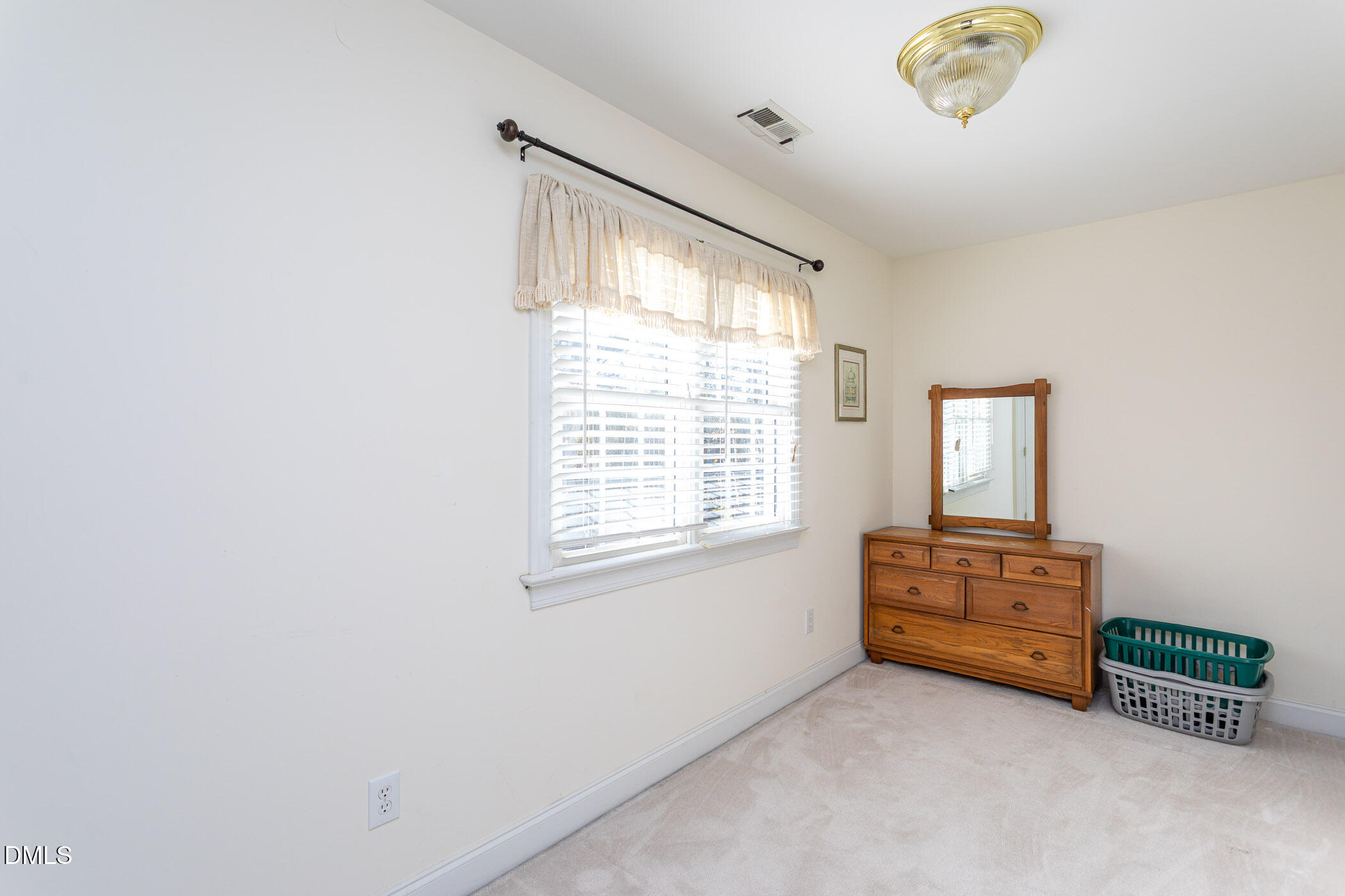 9409 Ray Road Raleigh, NC 27613 - Photo 18 of 47 a room with toys and a window