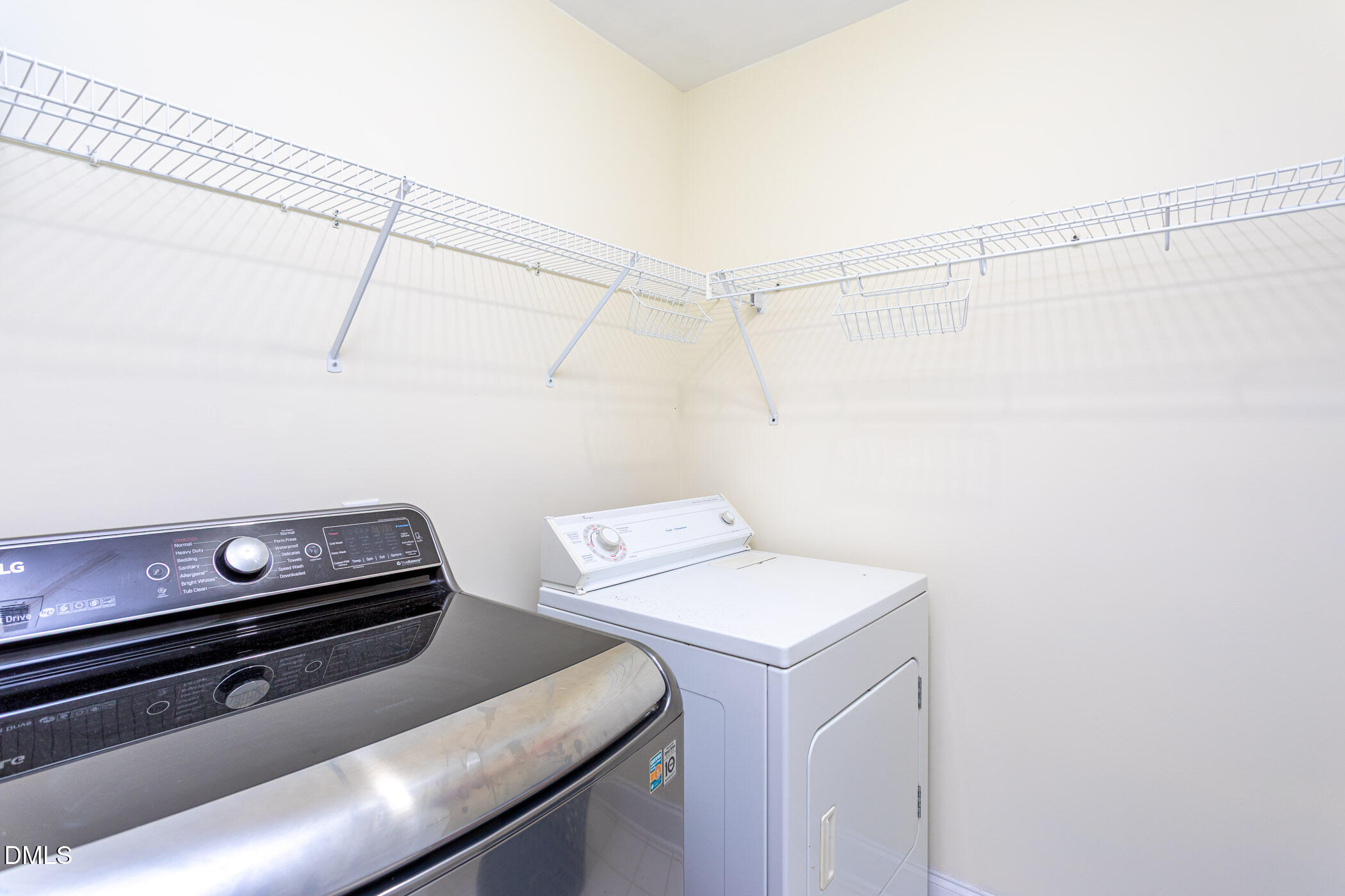 9409 Ray Road Raleigh, NC 27613 - Photo 23 of 47 a utility room with dryer and washer