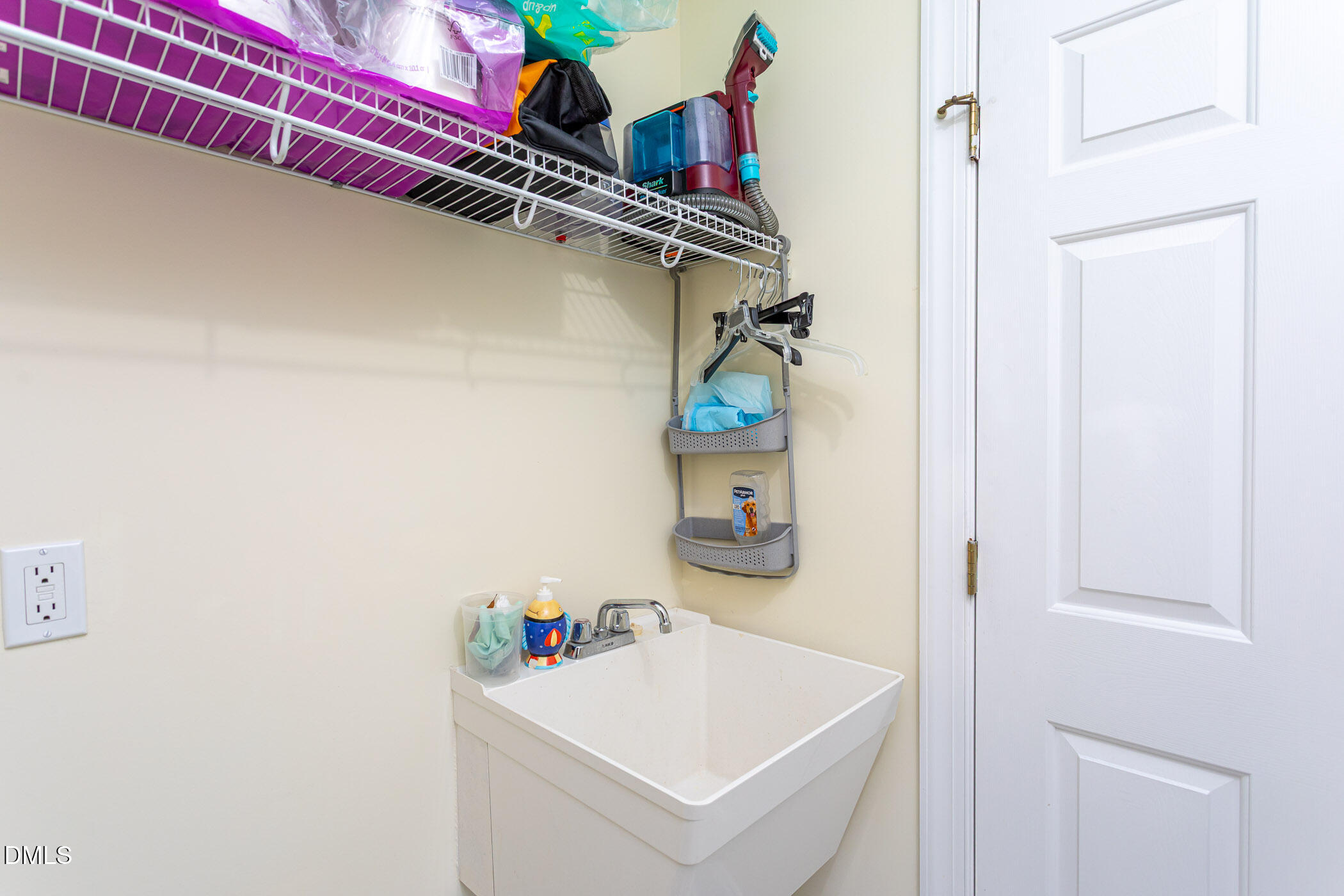9409 Ray Road Raleigh, NC 27613 - Photo 24 of 47 a utility room with dryer and washer