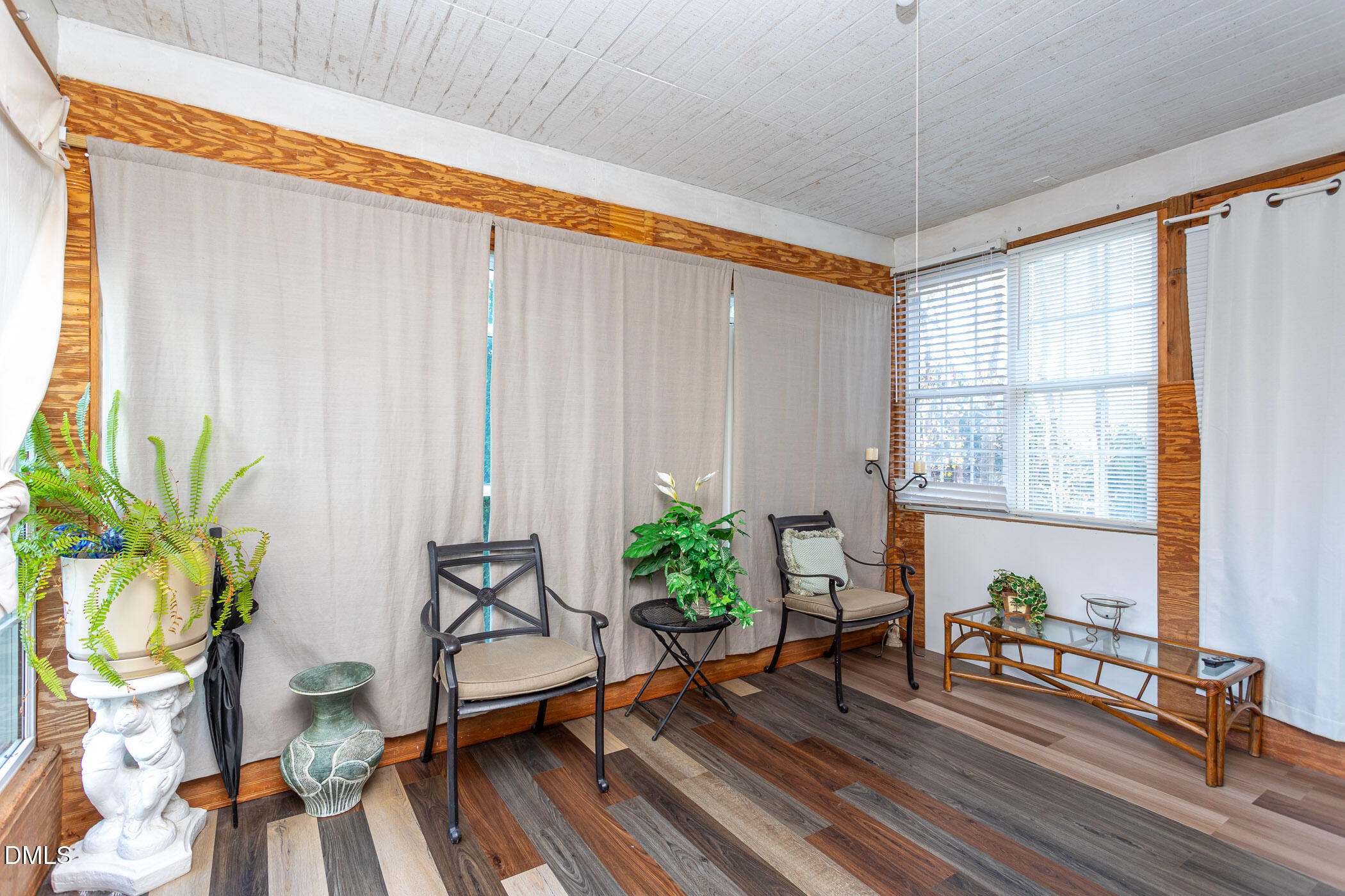 9409 Ray Road Raleigh, NC 27613 - Photo 35 of 47 a living room with patio furniture