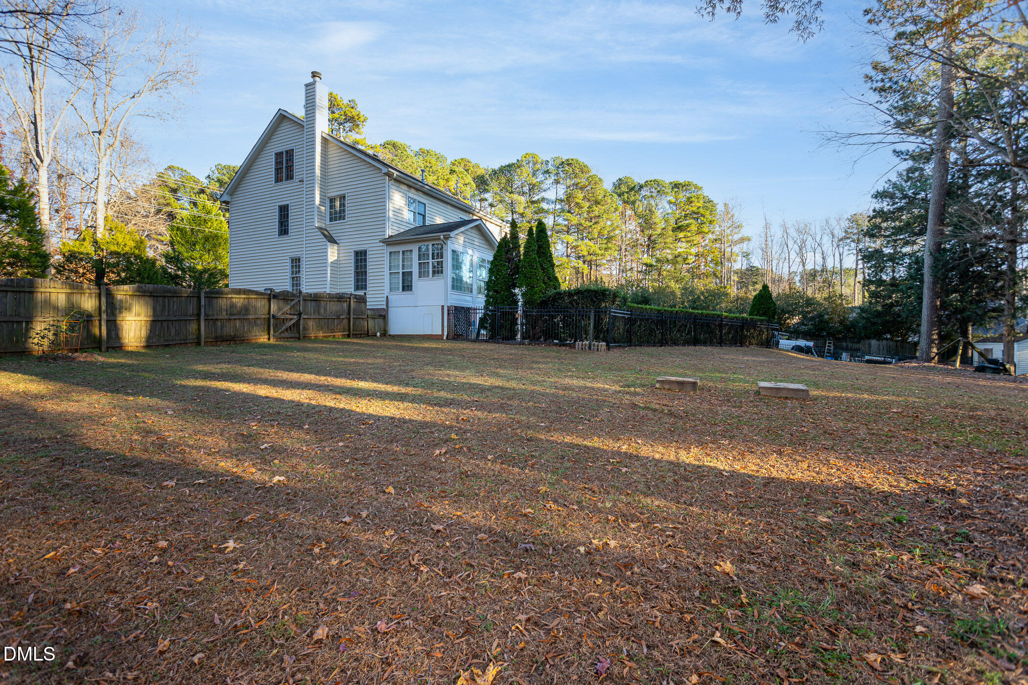 9409 Ray Road Raleigh, NC 27613 - Photo 42 of 47 a front view of a house with a yard and outdoor space