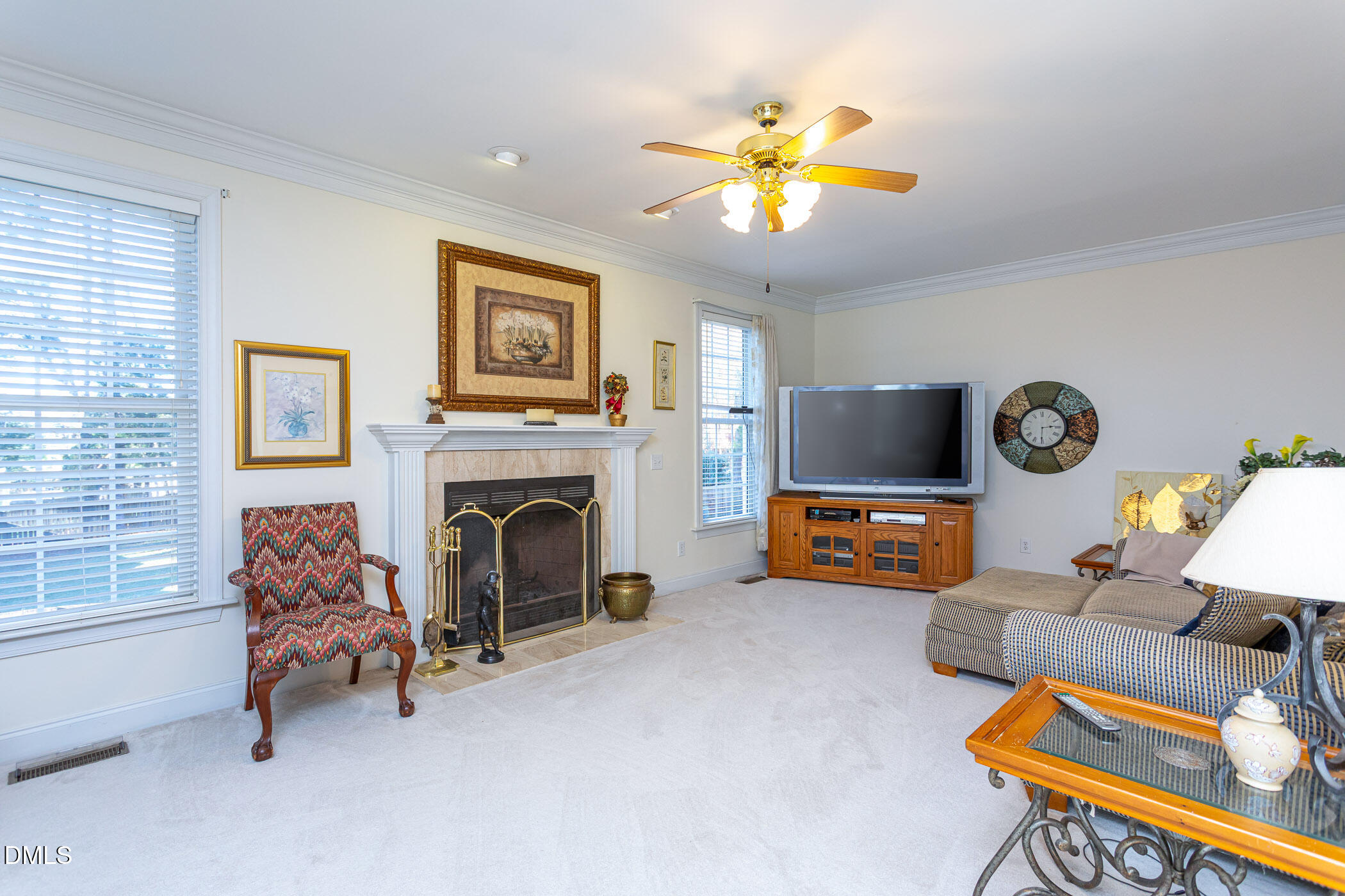 9409 Ray Road Raleigh, NC 27613 - Photo 6 of 47 a living room with furniture and a fireplace