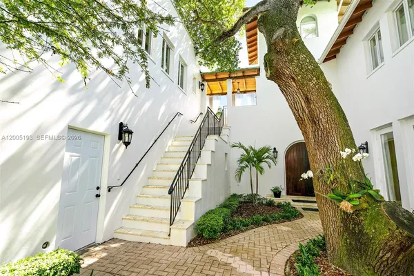 a view of stairs and yard
