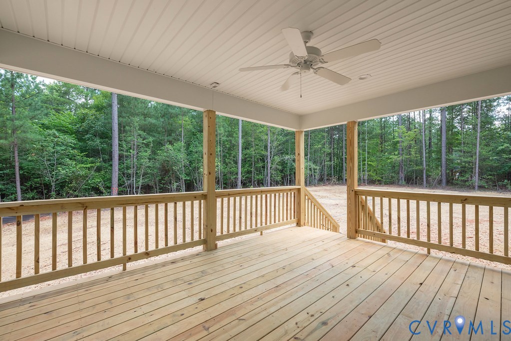 Lot 6 Tabscott Road Columbia, VA 23038 - Photo 43 of 49 Wooden terrace with a ceiling fan and a wooded vie