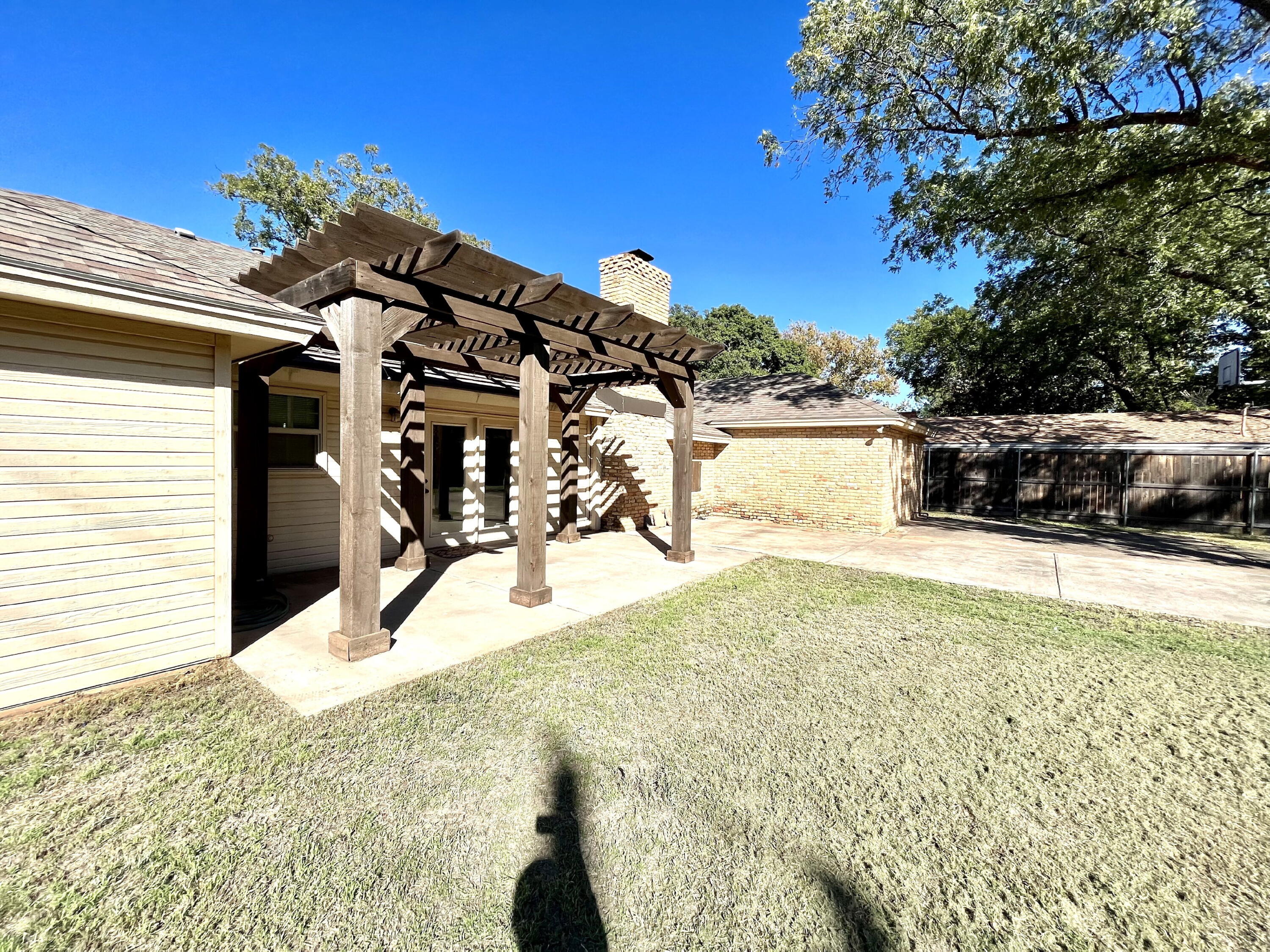 3321 55th Street Lubbock, TX 79413 - Photo 24 of 26 a view of a house with a snow in the yard