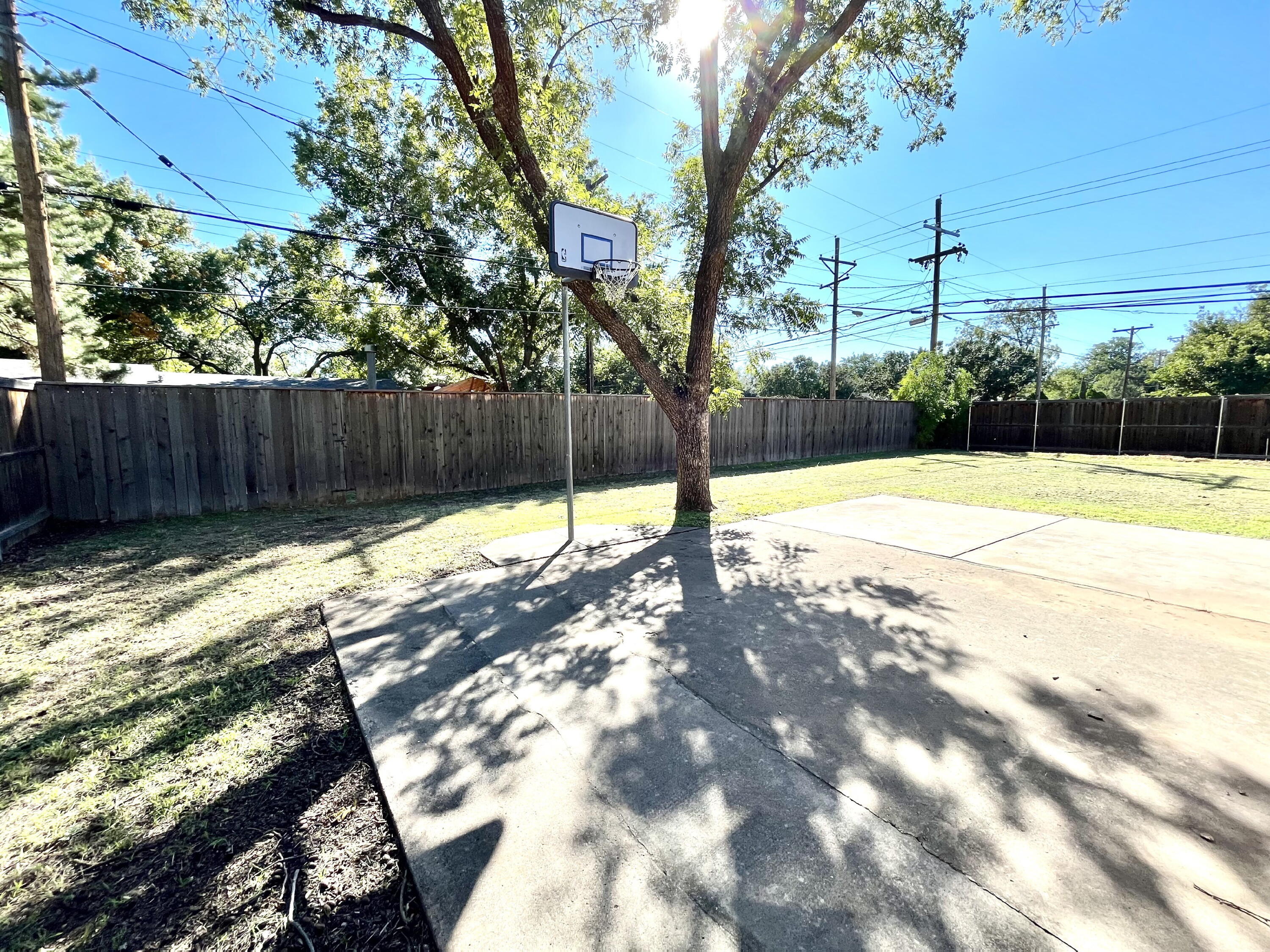 3321 55th Street Lubbock, TX 79413 - Photo 26 of 26 a view of a yard with a tree