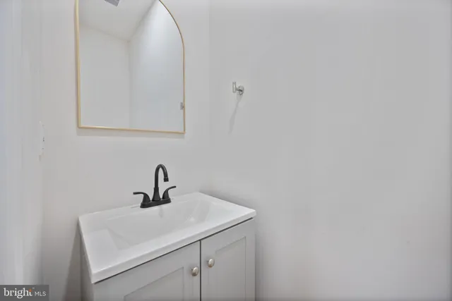 a bathroom with a toilet and a sink