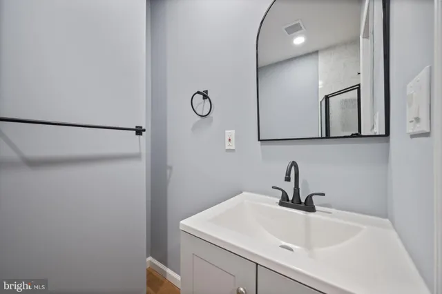 a view of a hallway with staircase