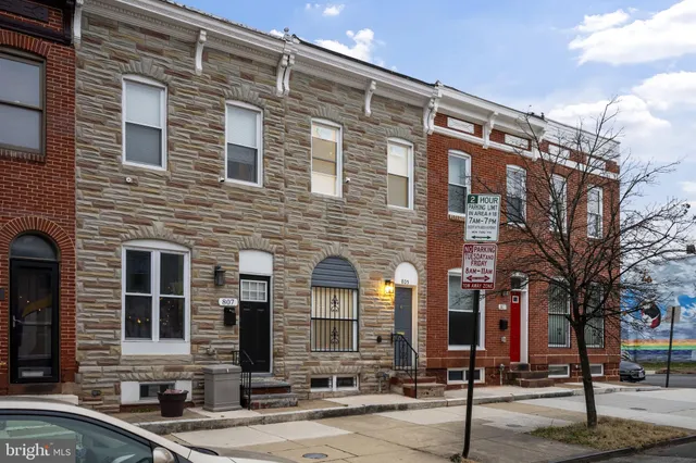 a front view of a building with street