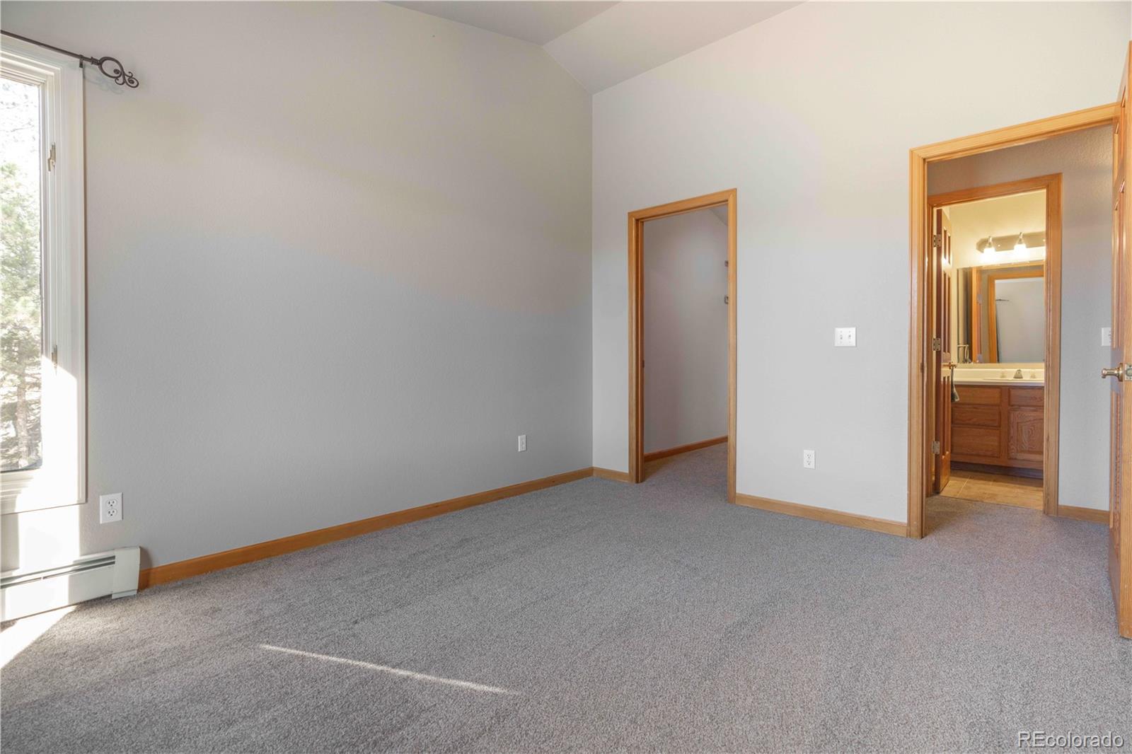 318 Rd D Pine, CO 80470 - Photo 45 of 50 an empty room with windows