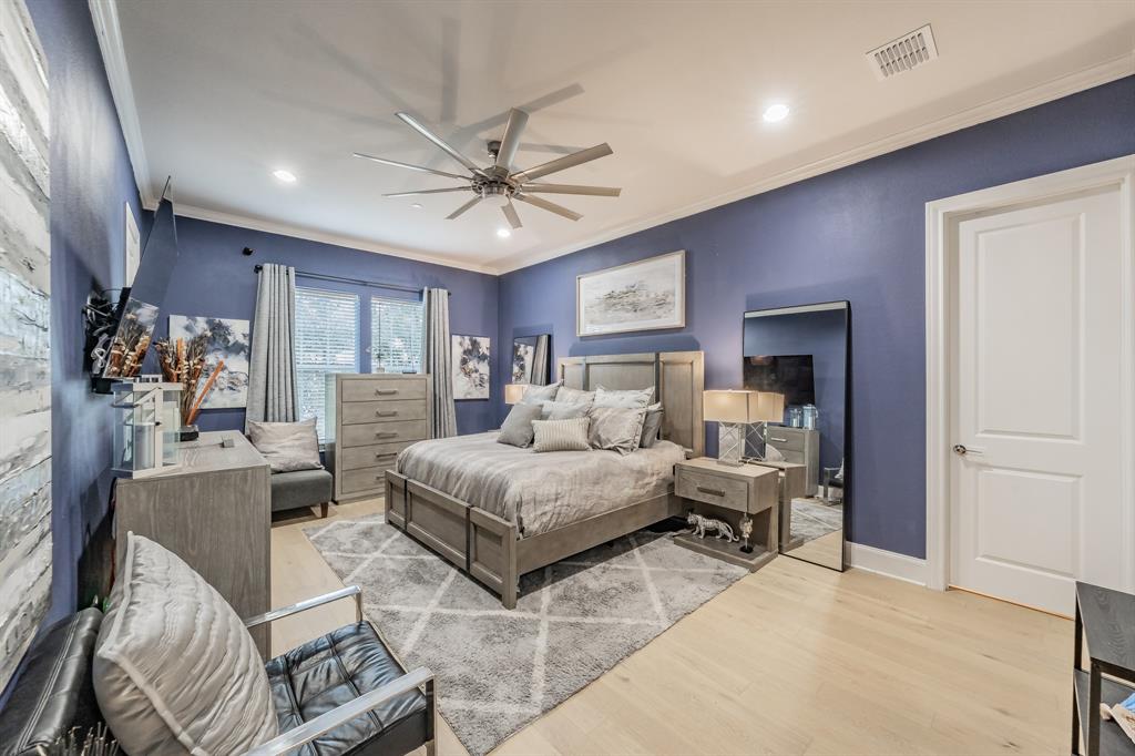 7333 Valley View Lane, Unit 902 Dallas, TX 75240 - Photo 19 of 40 a living room with furniture and a chandelier