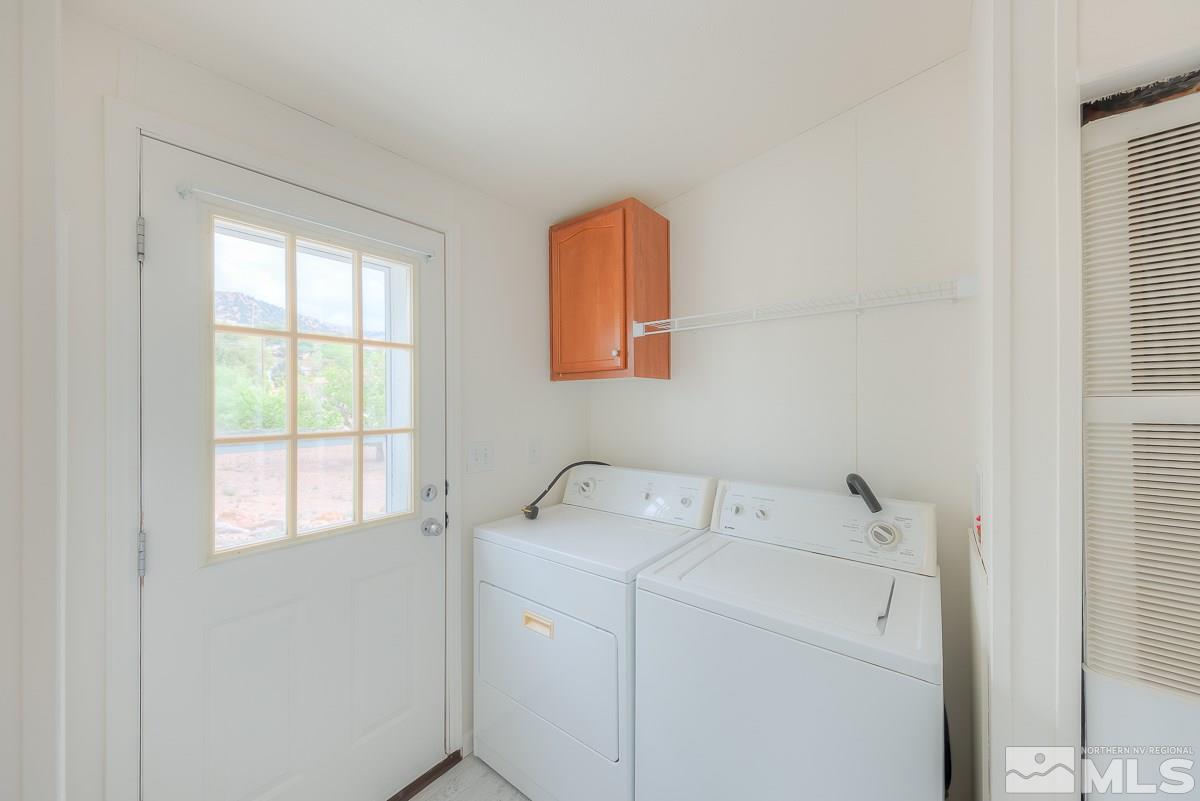 15186 Pinion Drive Reno, NV 89521 - Photo 16 of 20 a utility room with dryer and washer