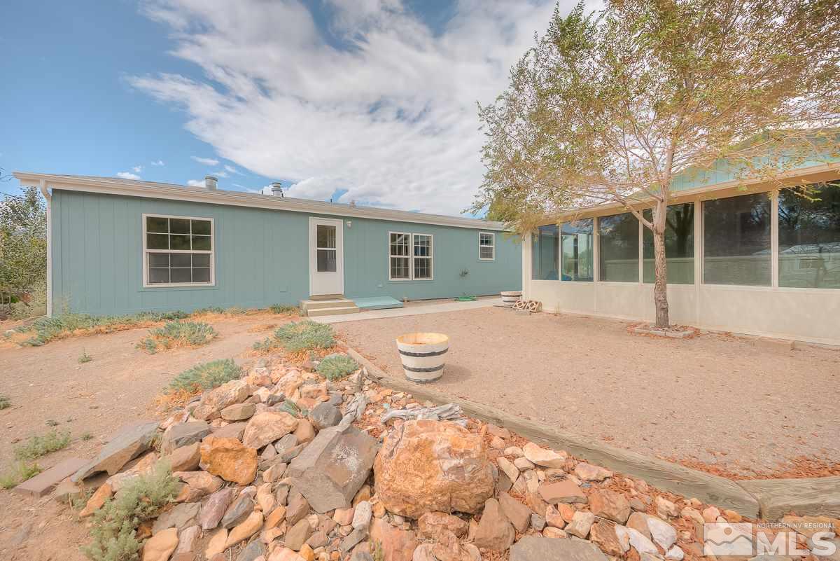 15186 Pinion Drive Reno, NV 89521 - Photo 17 of 20 front view of a house with a outdoor space