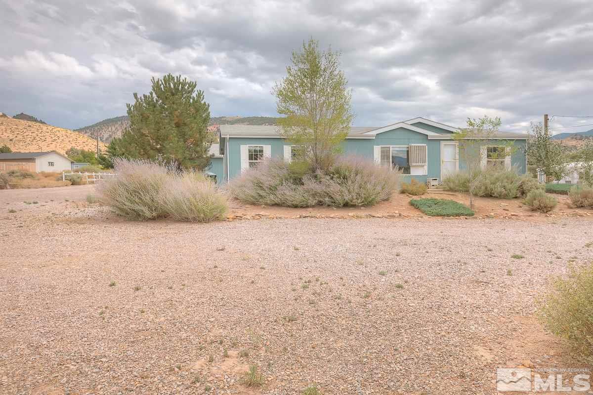 15186 Pinion Drive Reno, NV 89521 - Photo 20 of 20 a front view of a house with a yard